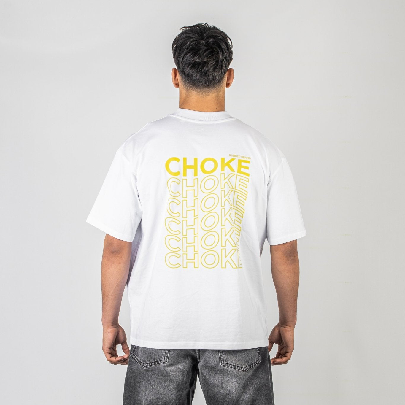 Camiseta Choke blanca Rubber Brand – Oversize BJJ gráfico tipográfico vinilo