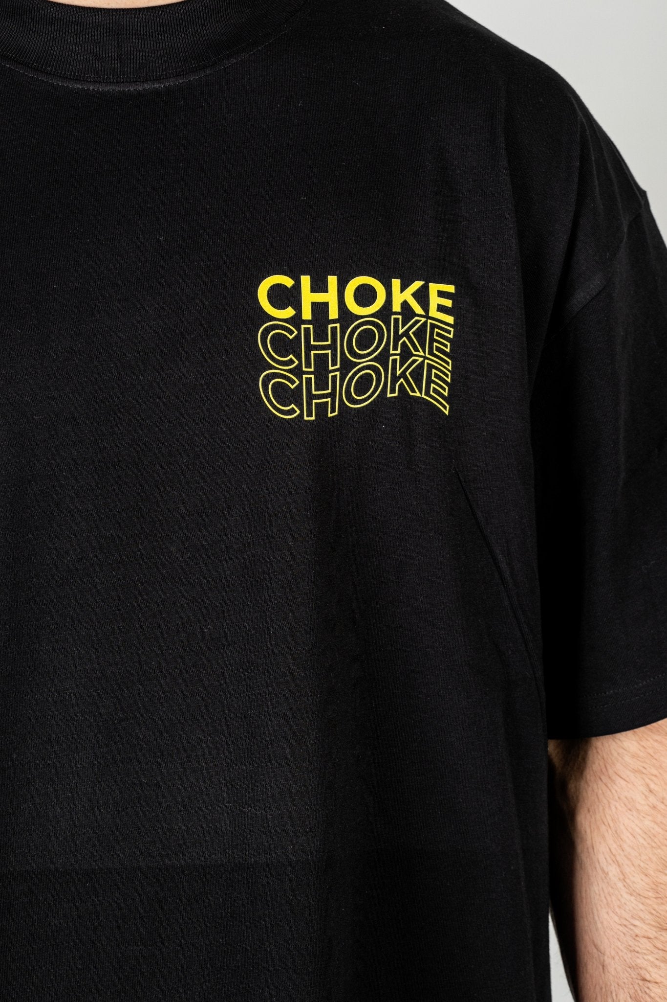 Camiseta "Choke" negra – Rubber Brand