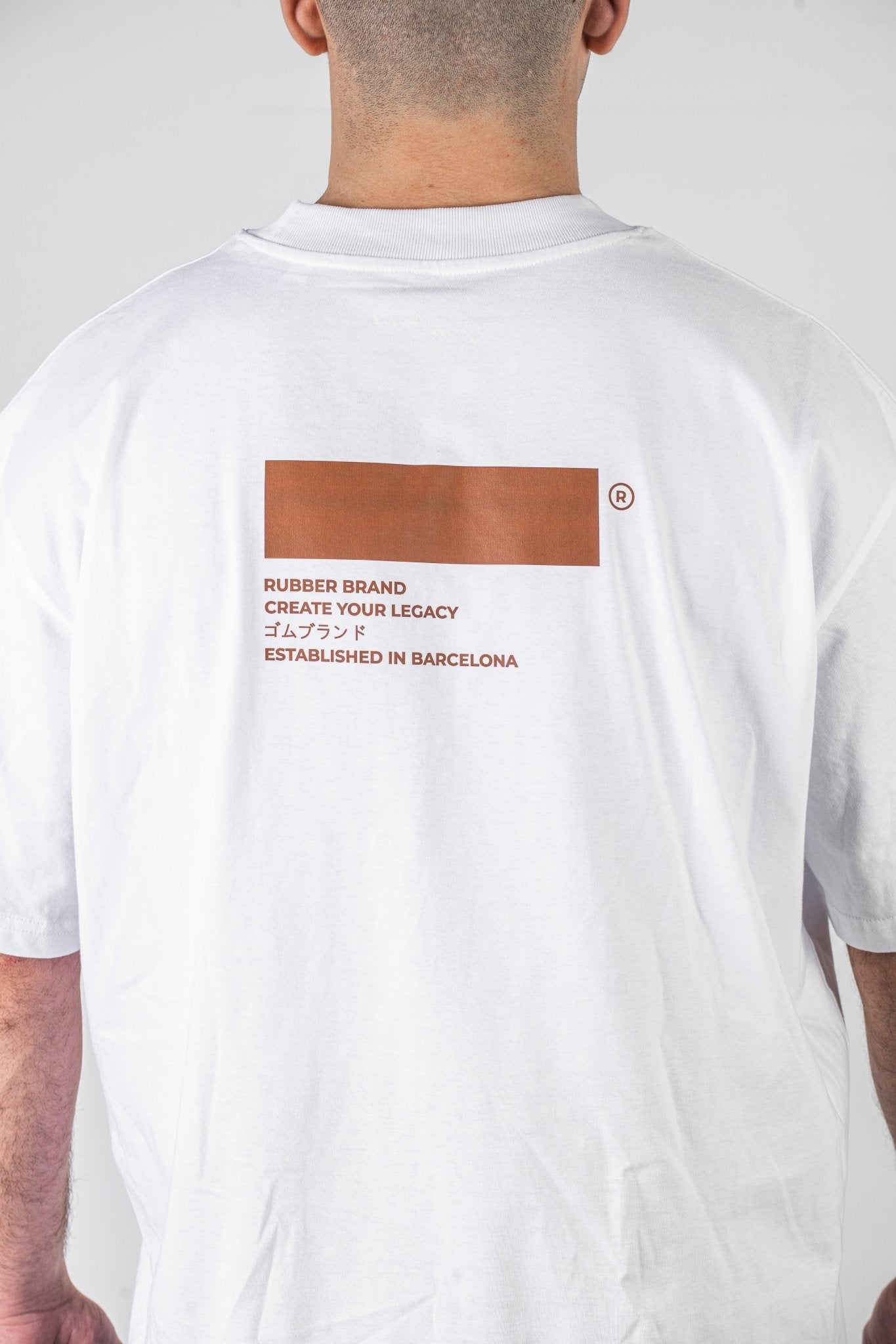 Camiseta "Create Your Legacy" blanca – Rubber Brand