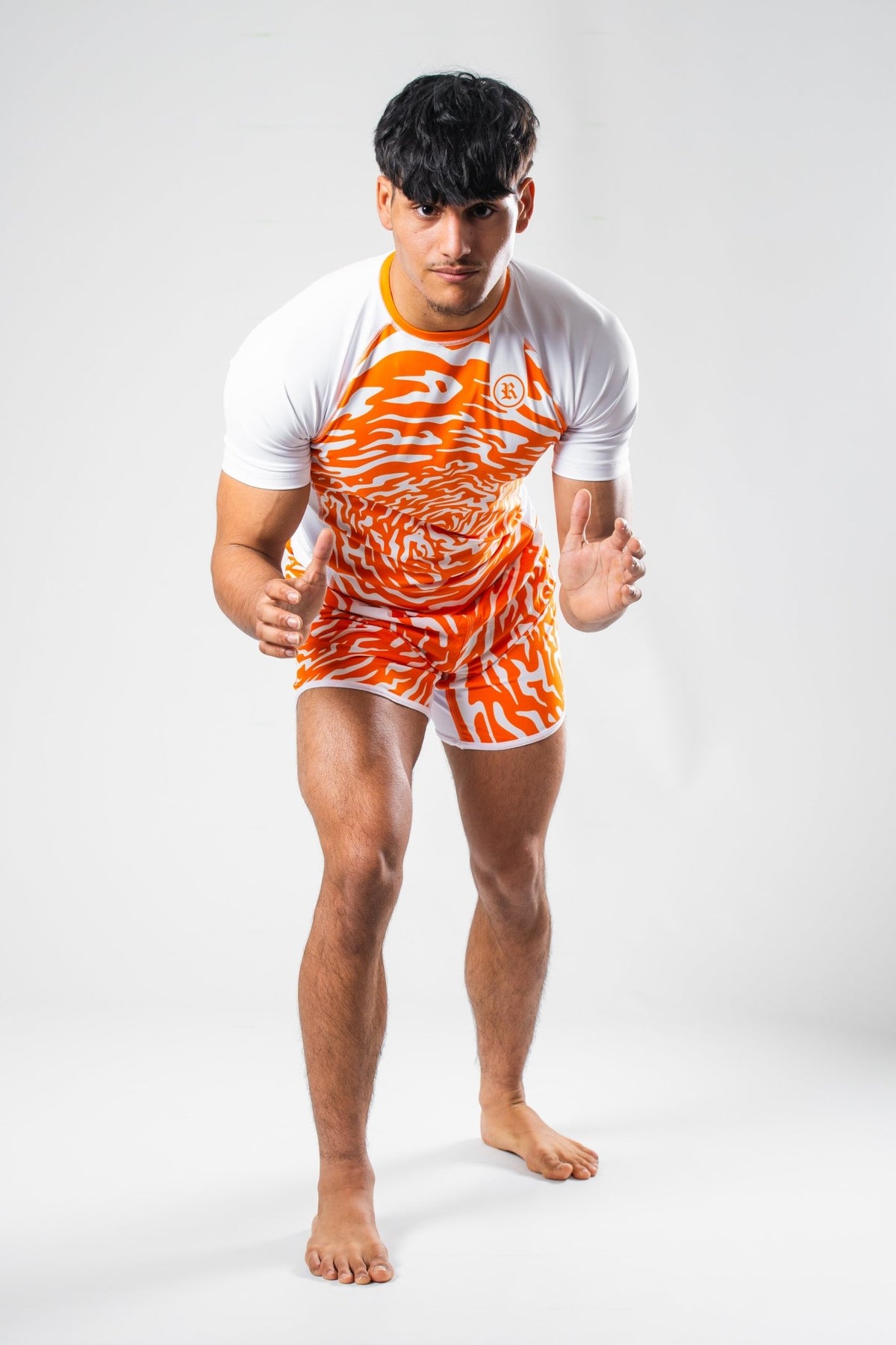 PARADOX v1.0 Rubber Brand – Vista frontal rashguard naranja grappling